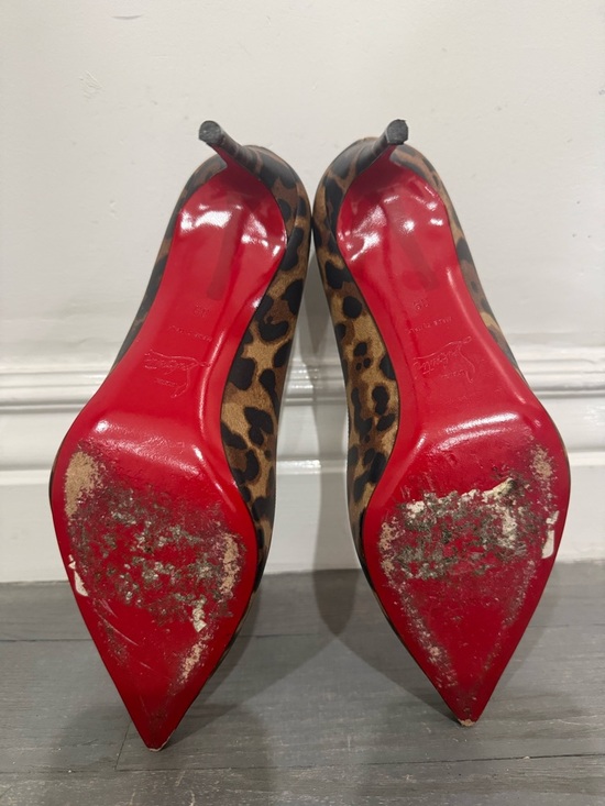 pointed toe cheetah print red bottom heels
